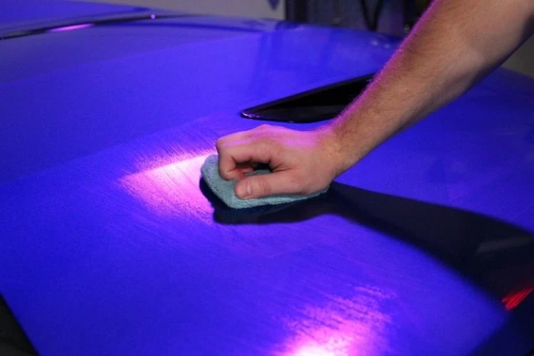 303 Graphene Nano Spray Coating spread on vehicle paint